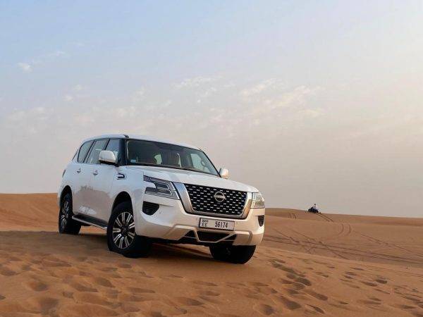 Evening Desert Safari Dubai – Sandboarding, Camel Ride, Live Shows & Dinner